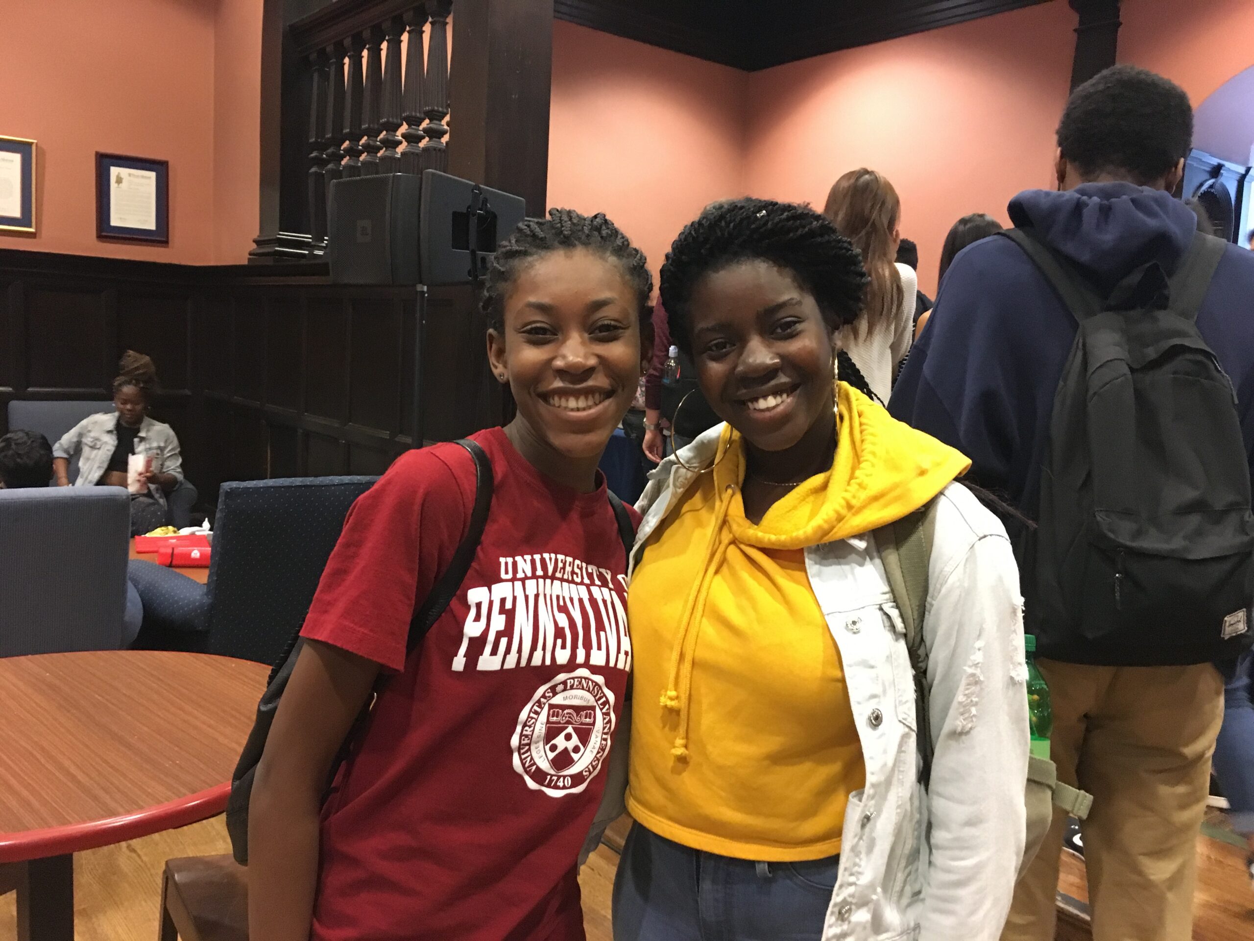 2 Students pose for a photo at the Houston Hall Open House